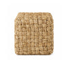 High-angled perspective showcasing the uniform square silhouette and handcrafted texture of the seagrass pouf