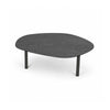 Perspective view highlighting the slim profile of the charcoal slate tabletop and the simple cylindrical leg design