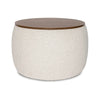 Front view of the Ash round storage ottoman featuring cream bouclé upholstery and a dark wood circular lid 
