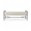 Front view of the Charlotte bench featuring light gray chevron-patterned upholstery and a minimalist black metal frame