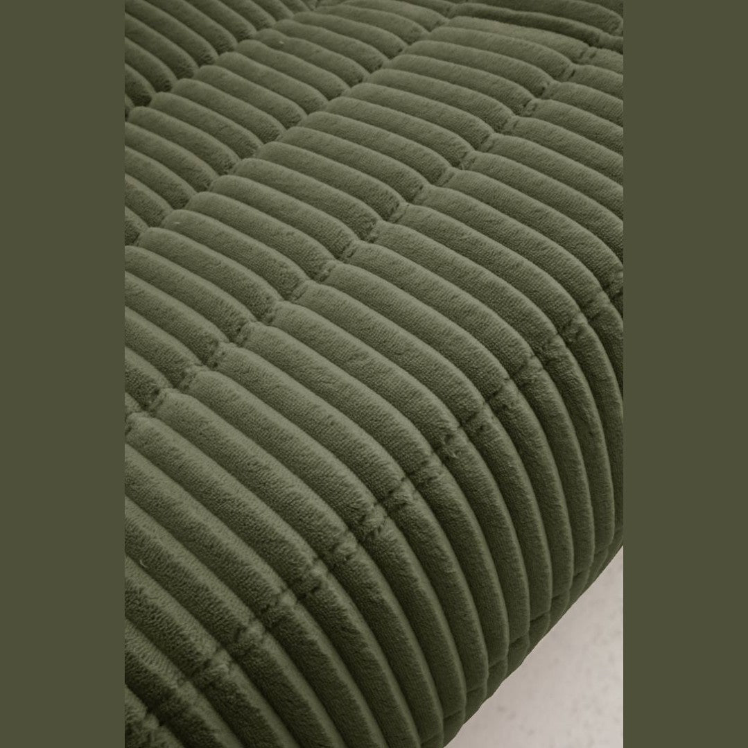 Large front view of the Rigo accent chair in beige corduroy fabric with a low-profile channeled design.