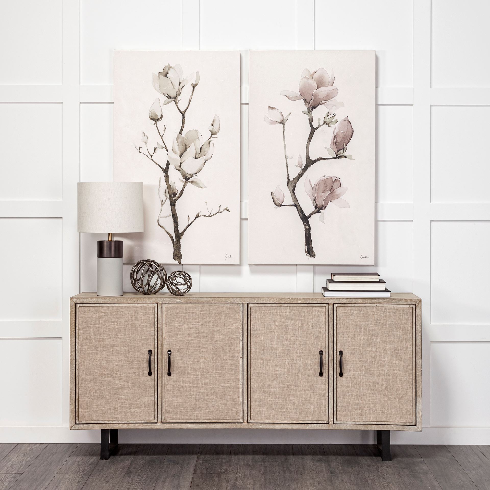 Front view of the Bellefontaine sideboard featuring textured grasscloth door panels and matte black vertical metal handles