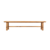 Front view of the D-Bodhi Artisan bench showcasing its long minimalist profile and natural reclaimed wood texture