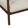 Close-up of the Shoji Cream linen cushion meeting the dark wood frame joint