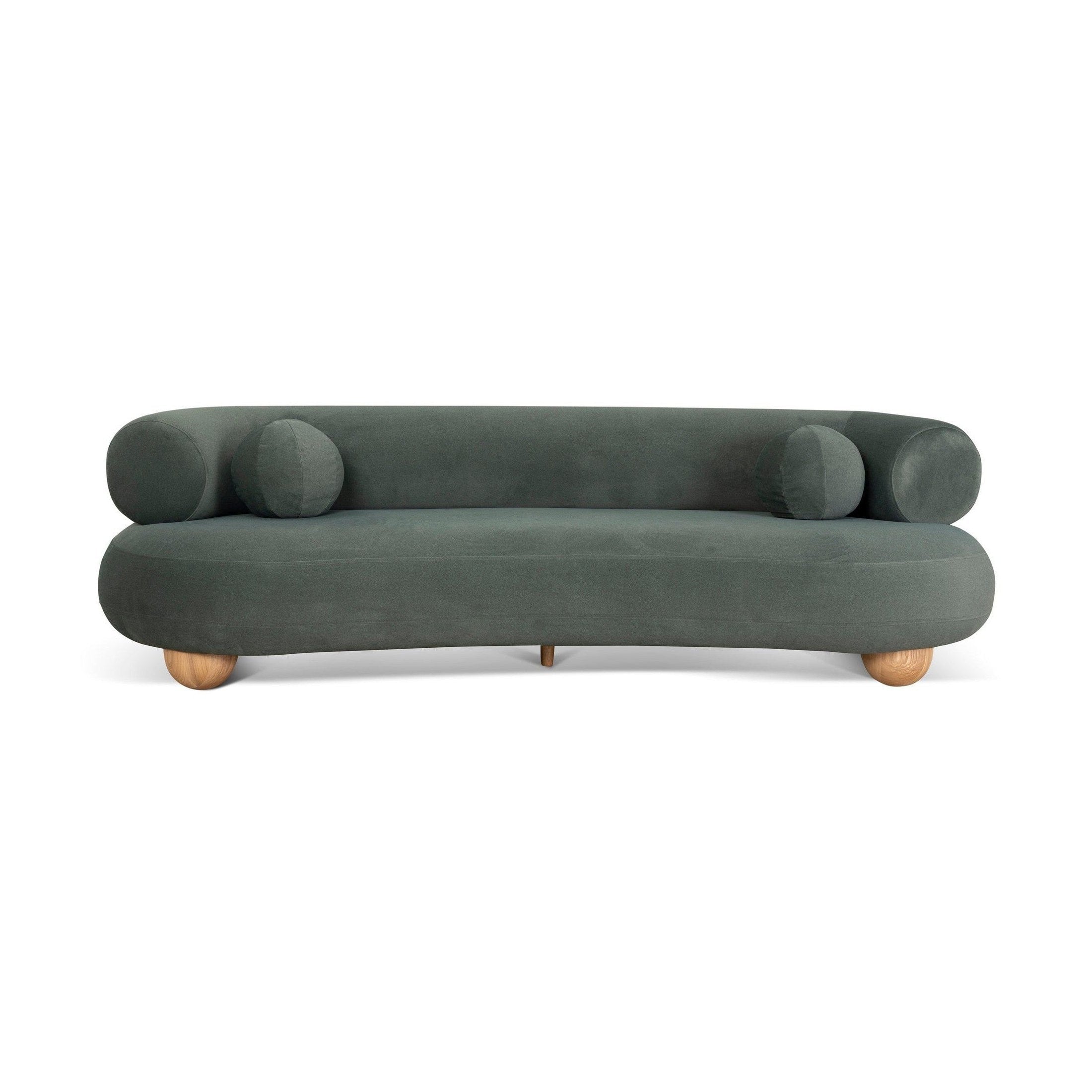 Ebba sofa in textured cream fabric with rounded arms and decorative circular pillows