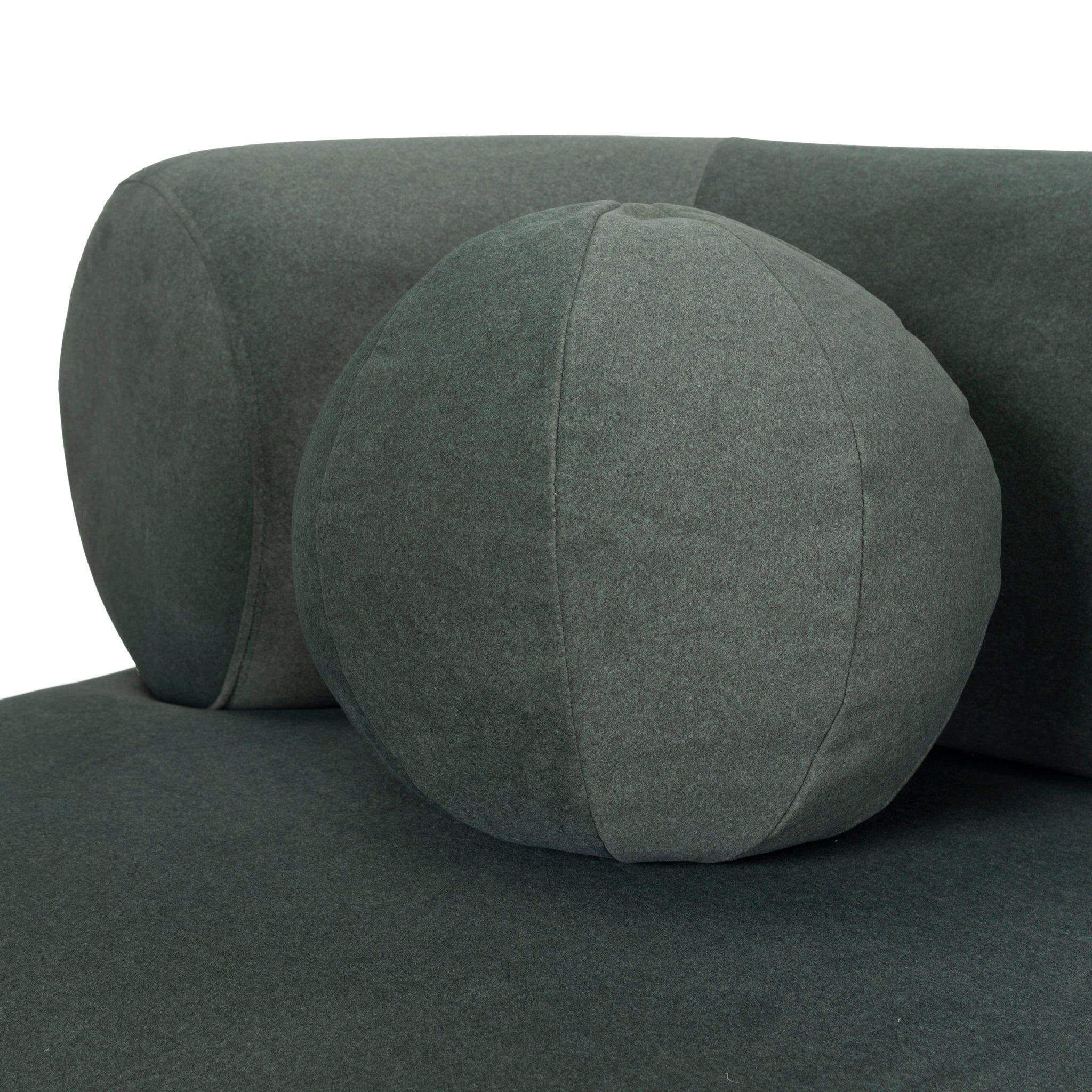 Ebba sofa in textured cream fabric with rounded arms and decorative circular pillows