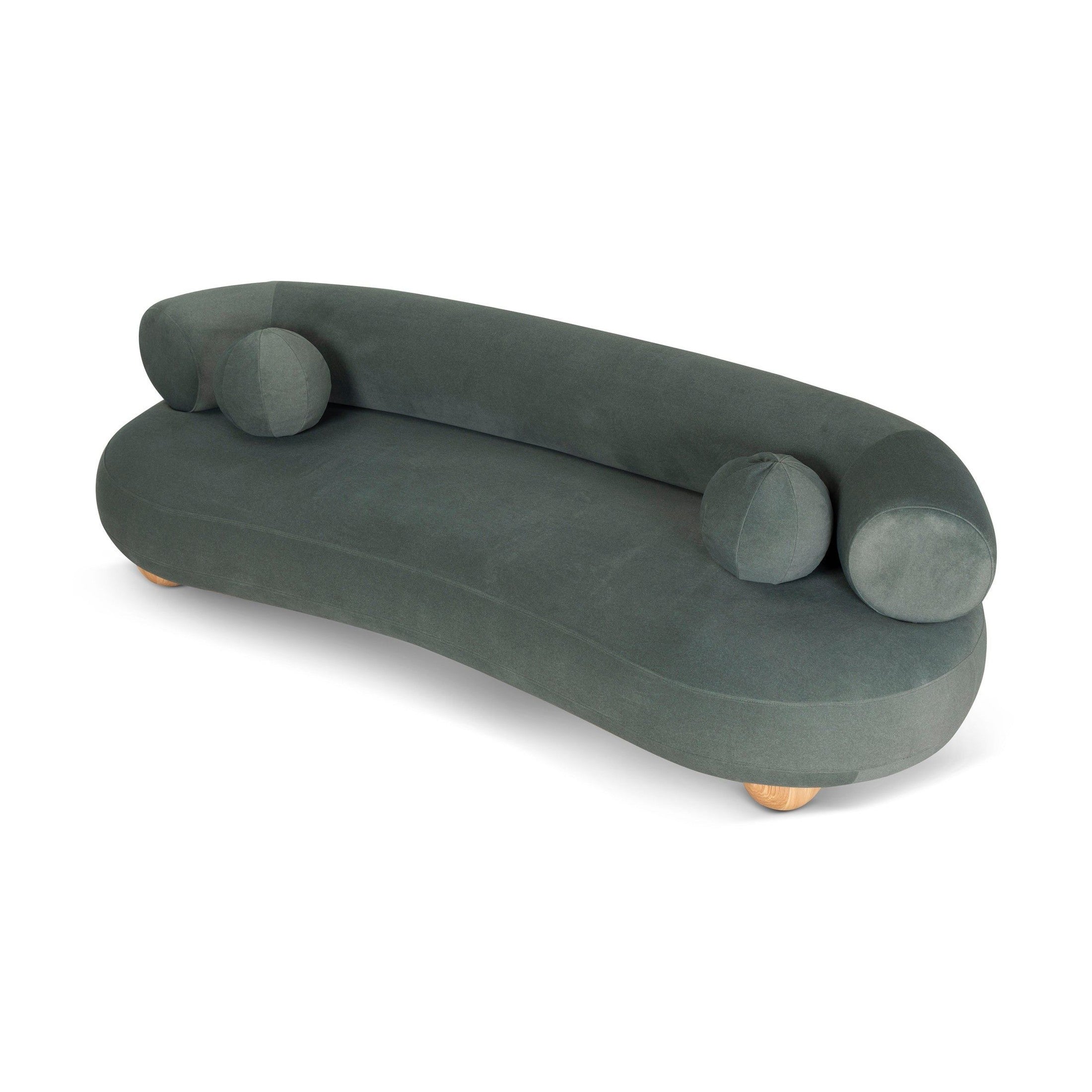 Ebba sofa in textured cream fabric with rounded arms and decorative circular pillows