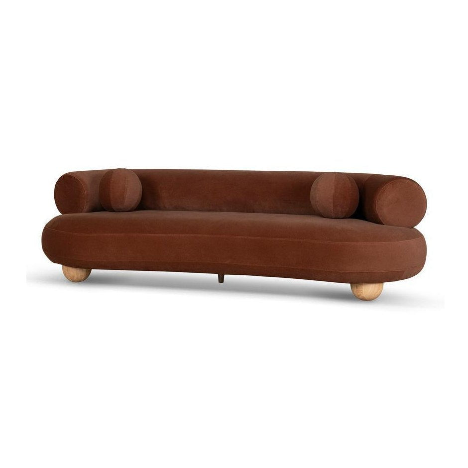 Ebba sofa in textured cream fabric with rounded arms and decorative circular pillows