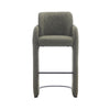 Elina counter stool wrapped in green upholstery, high-density cushioning, built from strong metal and plywood, and upholstered in 100% polyester fabric