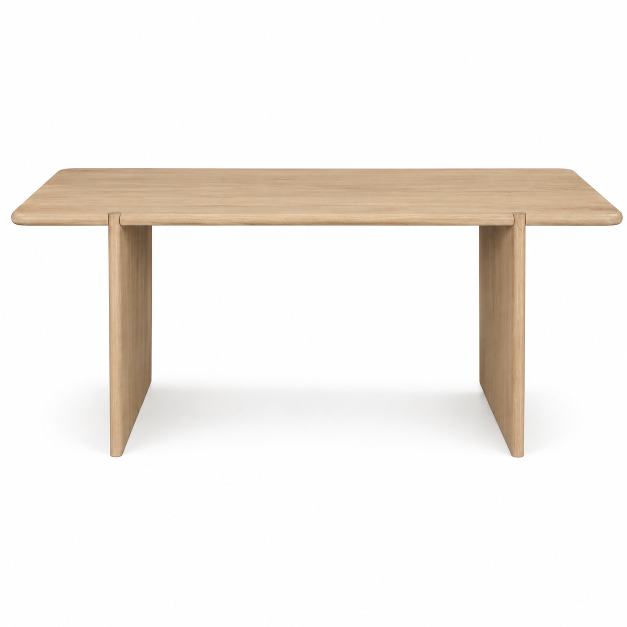 A minimalist rectangular wooden table with a light oak finish, featuring a thick top and two integrated block-style legs, shown against a plain white background.