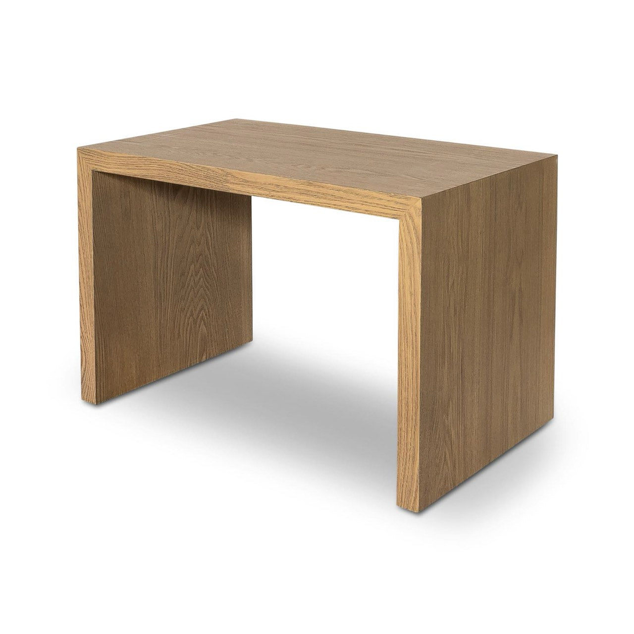 Front view of the Forest coffee ottoman featuring a cream upholstered rectangular bench with a nested blonde oak waterfall table