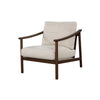 Three-quarter perspective of the Bernard chair highlighting the sloped armrests and plush cushions