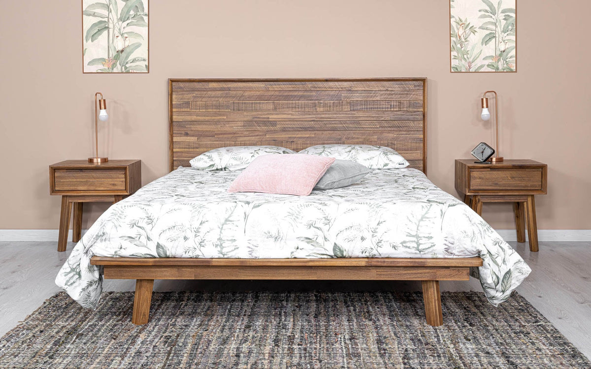 Front view of the Gia platform bed featuring a clean-lined headboard with horizontal wood planks in a weathered light oak finish