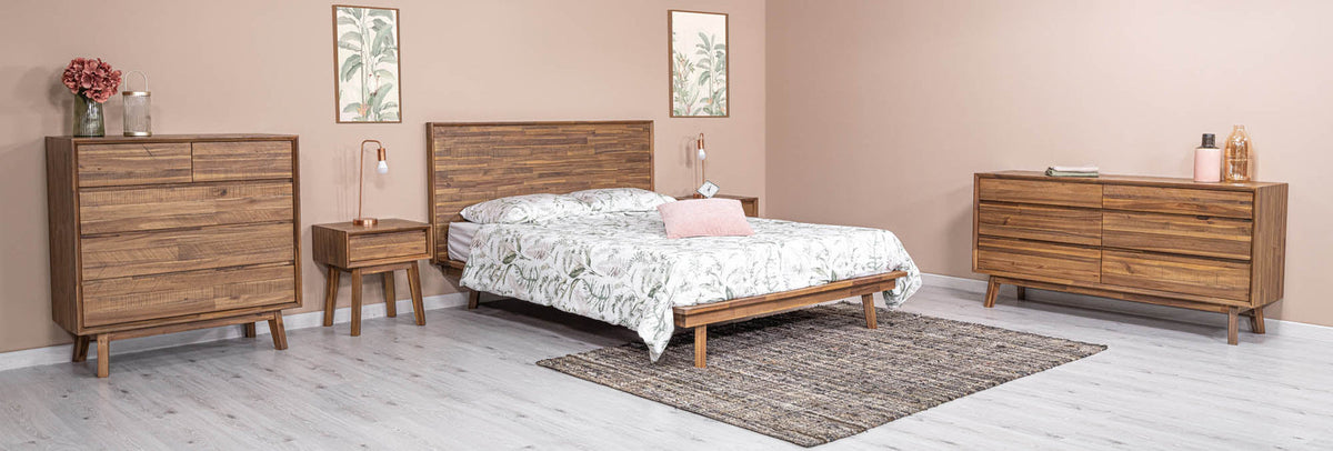 Front view of the Gia platform bed featuring a clean-lined headboard with horizontal wood planks in a weathered light oak finish