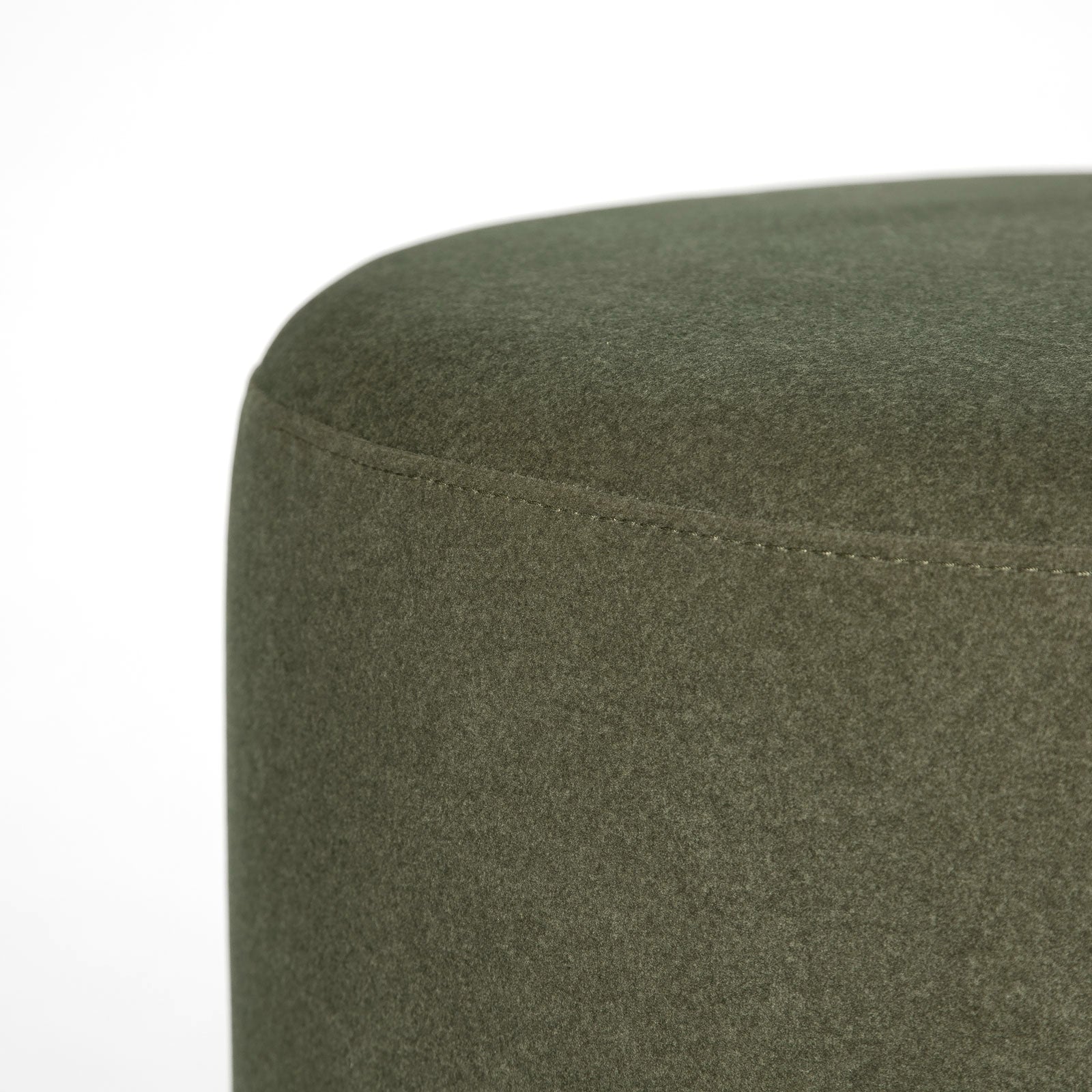 Front three-quarter view of the Ginger mushroom-shaped ottoman featuring rich chestnut brown velvet upholstery
