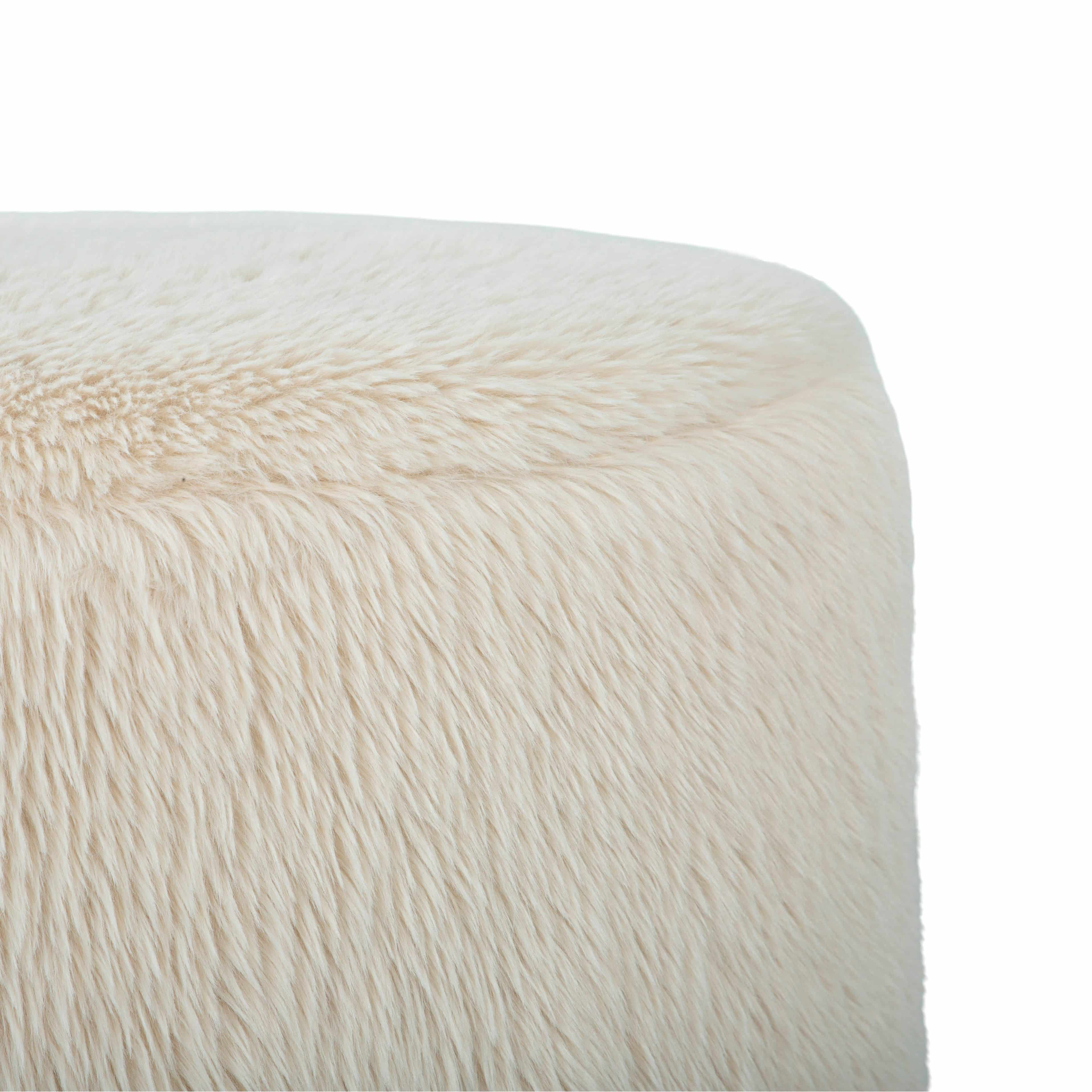 Front three-quarter view of the Ginger mushroom-shaped ottoman featuring rich chestnut brown velvet upholstery