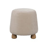Studio shot of the Giselle ottoman in a neutral beige linen-look fabric showcasing its versatile styling potential