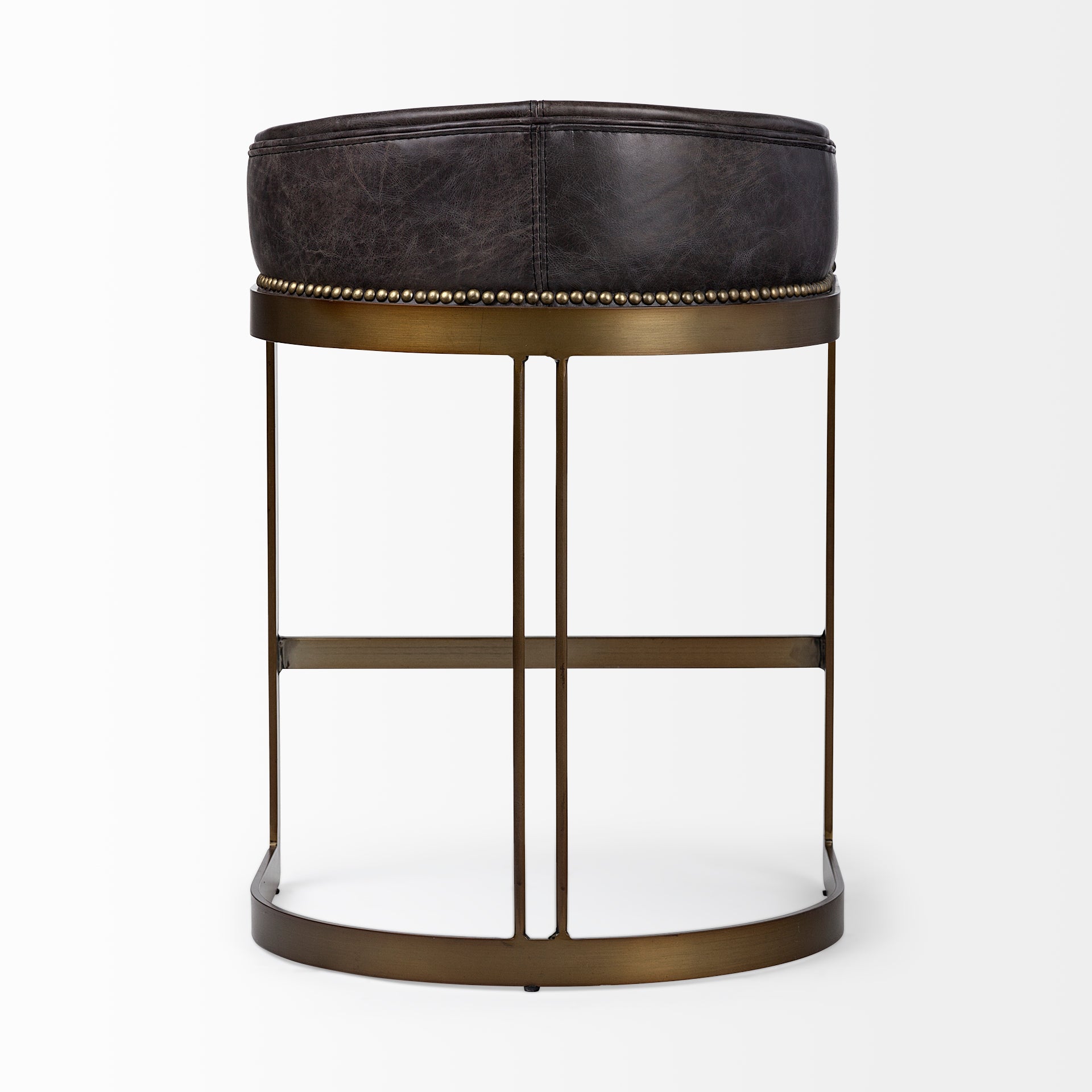A modern bar stool featuring a curved brown leather seat cushion and backrest, supported by a slim gold-finished metal frame with a curved base, shown against a plain white background.