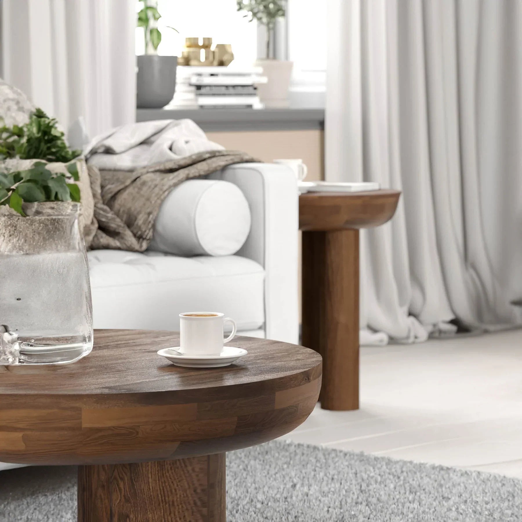 Lifestyle view of the Wilder table styled as a minimalist nightstand in a bright bedroom setting next to a white bed
