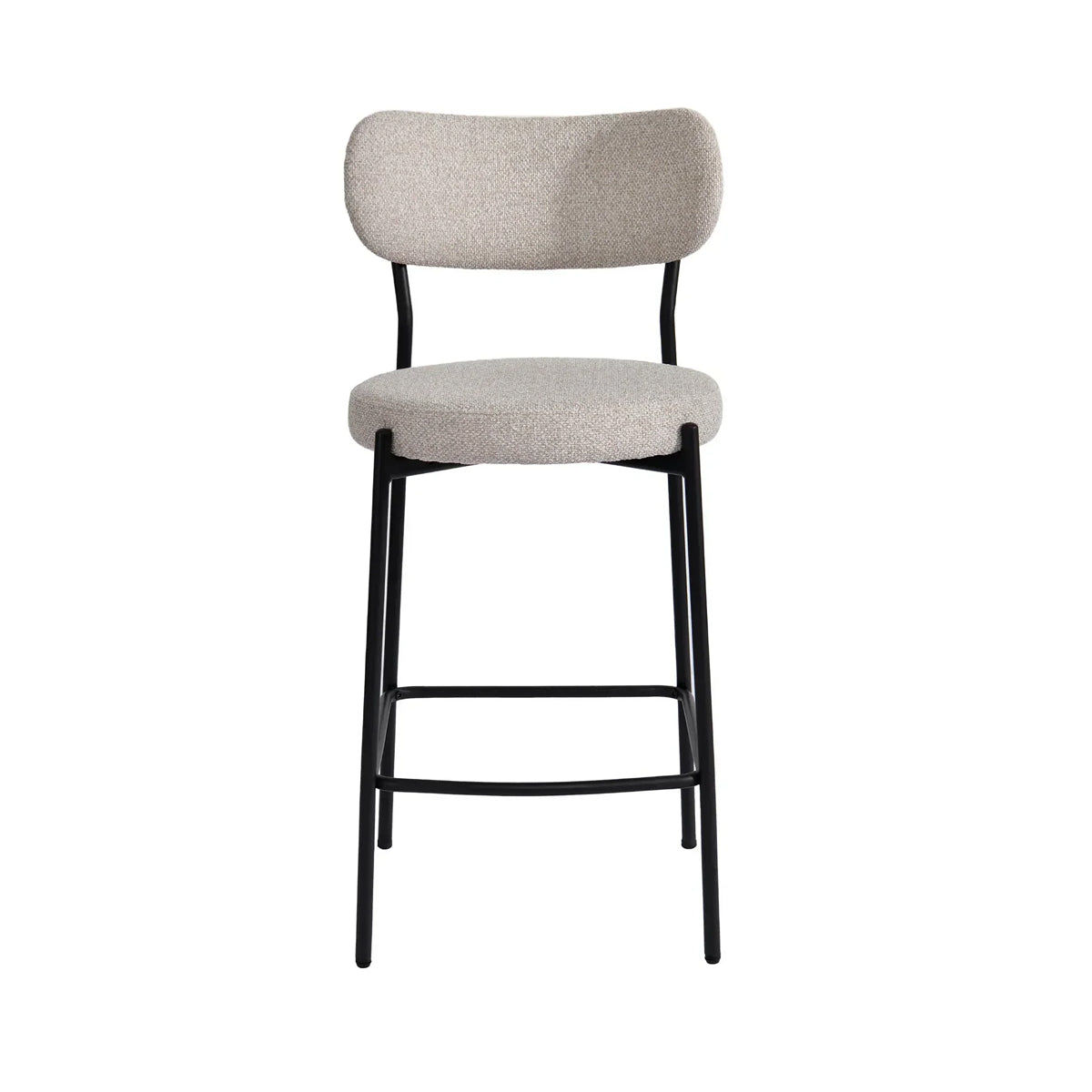 A modern bar stool with a textured dark gray fabric seat and backrest, supported by a slim black metal frame with a footrest.