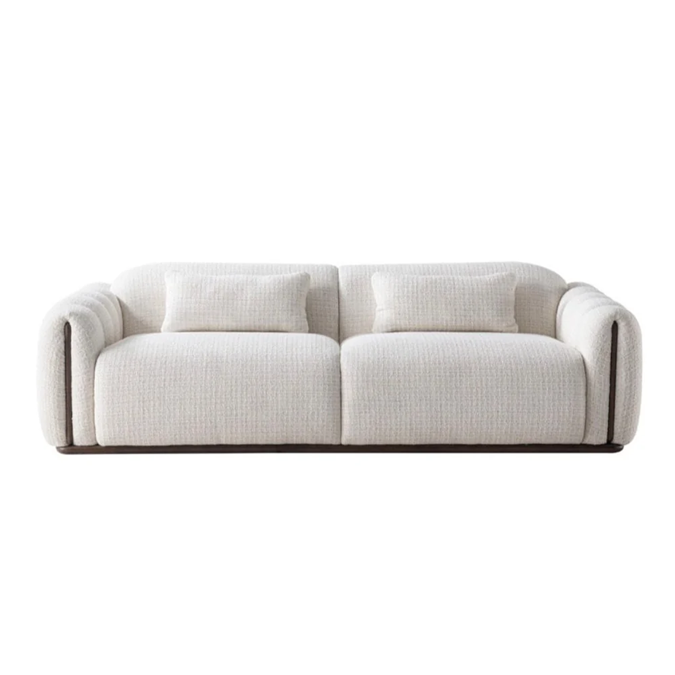 A modern two-seater sofa upholstered in a textured off-white bouclé fabric, featuring two matching throw pillows and dark brown wooden arm accents and base trim, shown against a solid white background.