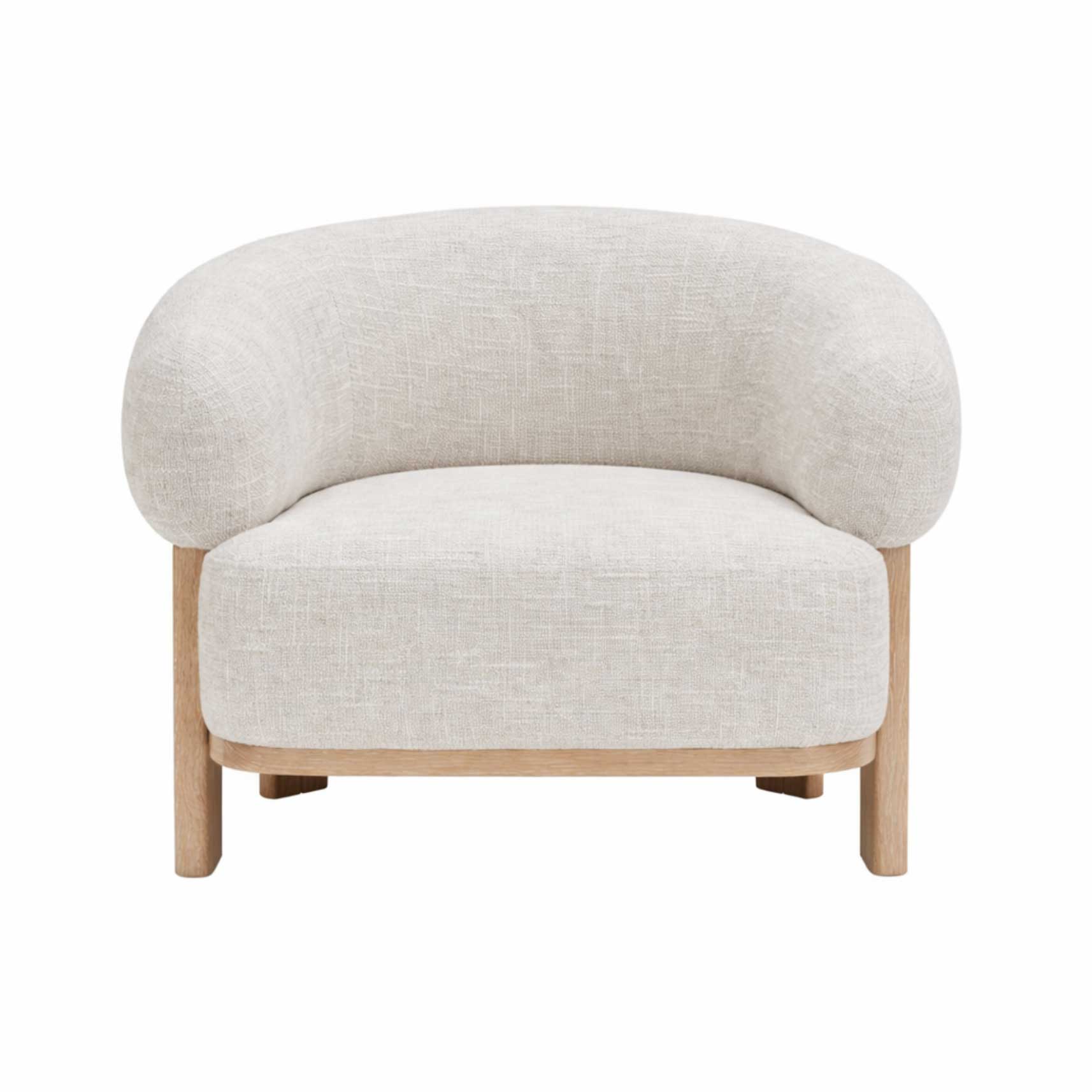 Front angled view of the Konsta accent chair featuring plush cream-colored upholstery and a low-profile natural wood cross-base frame