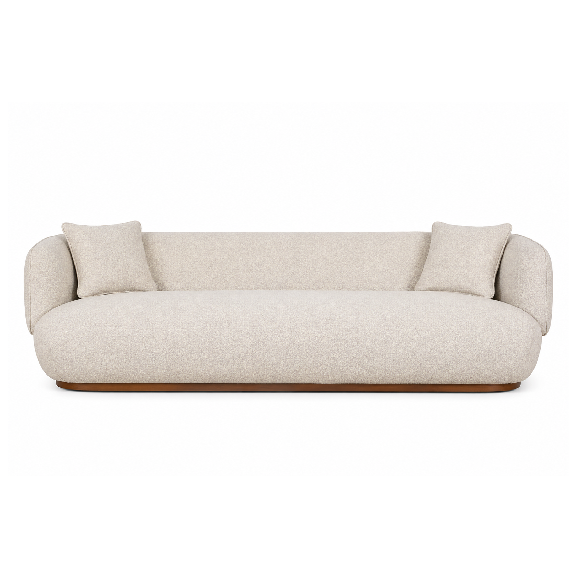 A modern curved sofa upholstered in a light beige textured fabric, featuring two matching square throw pillows and a low dark wood base, shown against a plain white background.