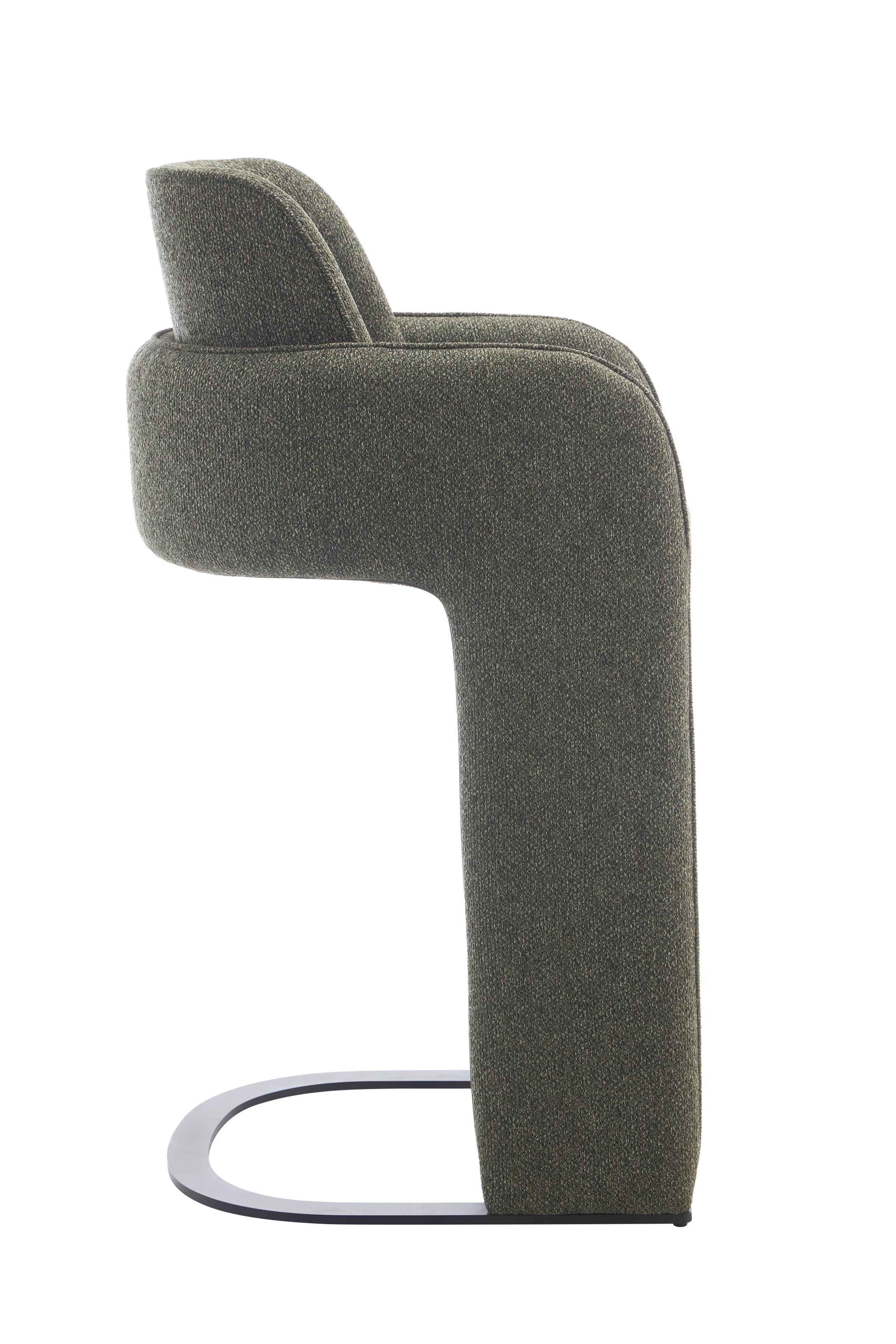 Elina counter stool wrapped in green upholstery, high-density cushioning, built from strong metal and plywood, and upholstered in 100% polyester fabric