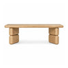 Front view of the Nelly dining bench in a lioness finish acacia wood featuring a thick rectangular top and block pedestal legs