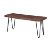 Front three-quarter view of the Organic bench featuring a matte brown live-edge wood top and black metal hairpin legs