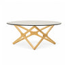 Front view of the Quasar coffee table featuring a circular glass top and a sculptural natural ash wood geometric base