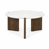 Front view of the Rumer coffee table featuring a circular white marble top and a dark brown wood tripod base with slab legs