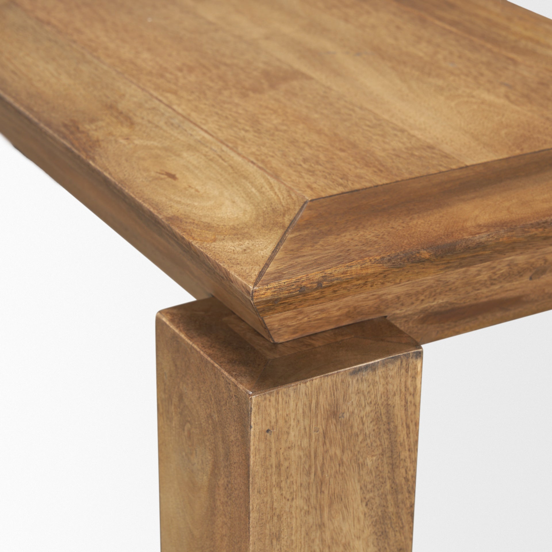 Front view of the Sapphira console table in a rich brown wood finish featuring a thick rectangular top and architectural block legs