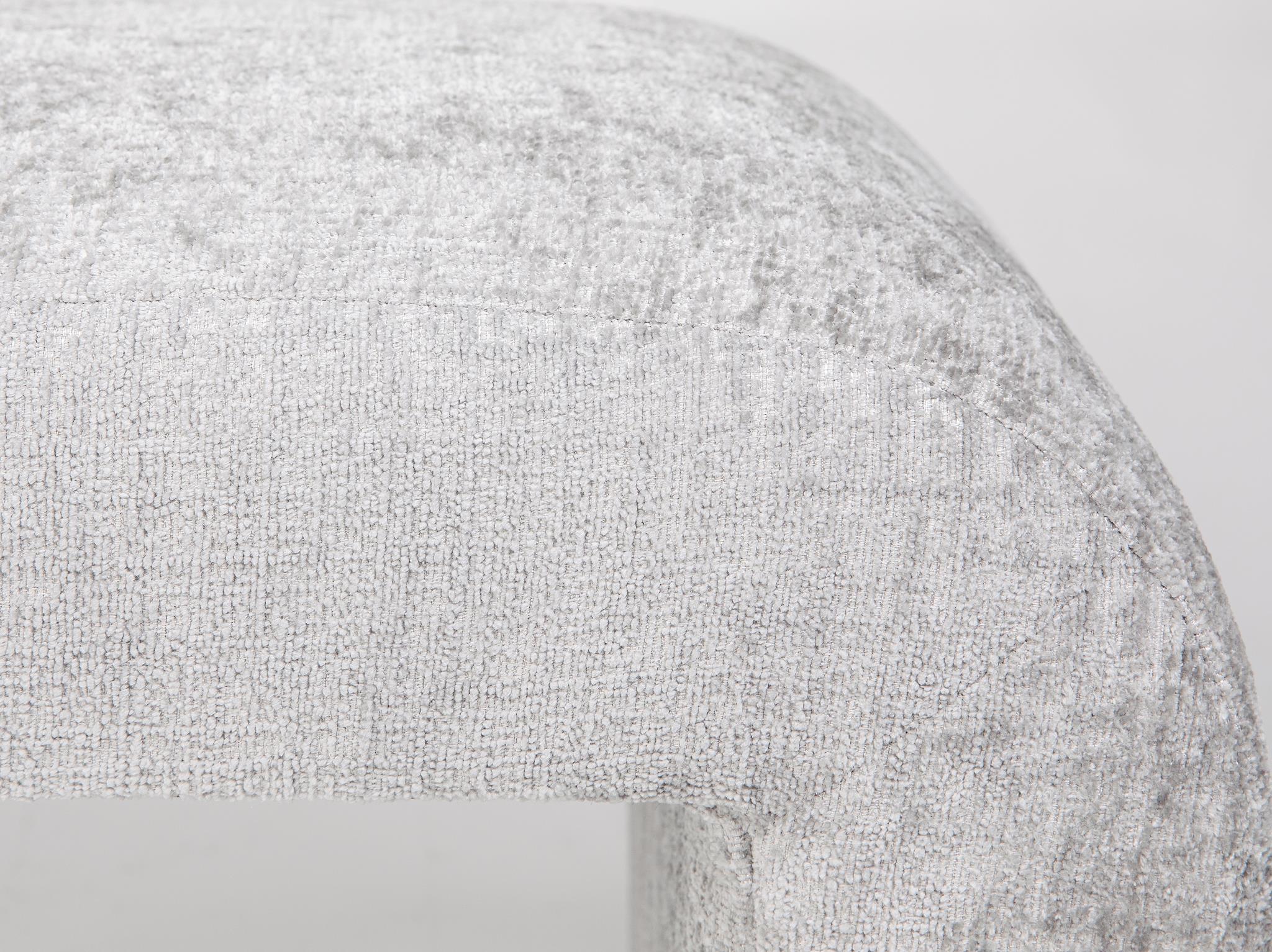 Front view of the Sophia large accent bench featuring a seamless waterfall silhouette and cream textured upholstery