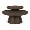 Front view of the Takoda nesting coffee table set featuring two dark brown wood circular tables with tapered pedestal bases