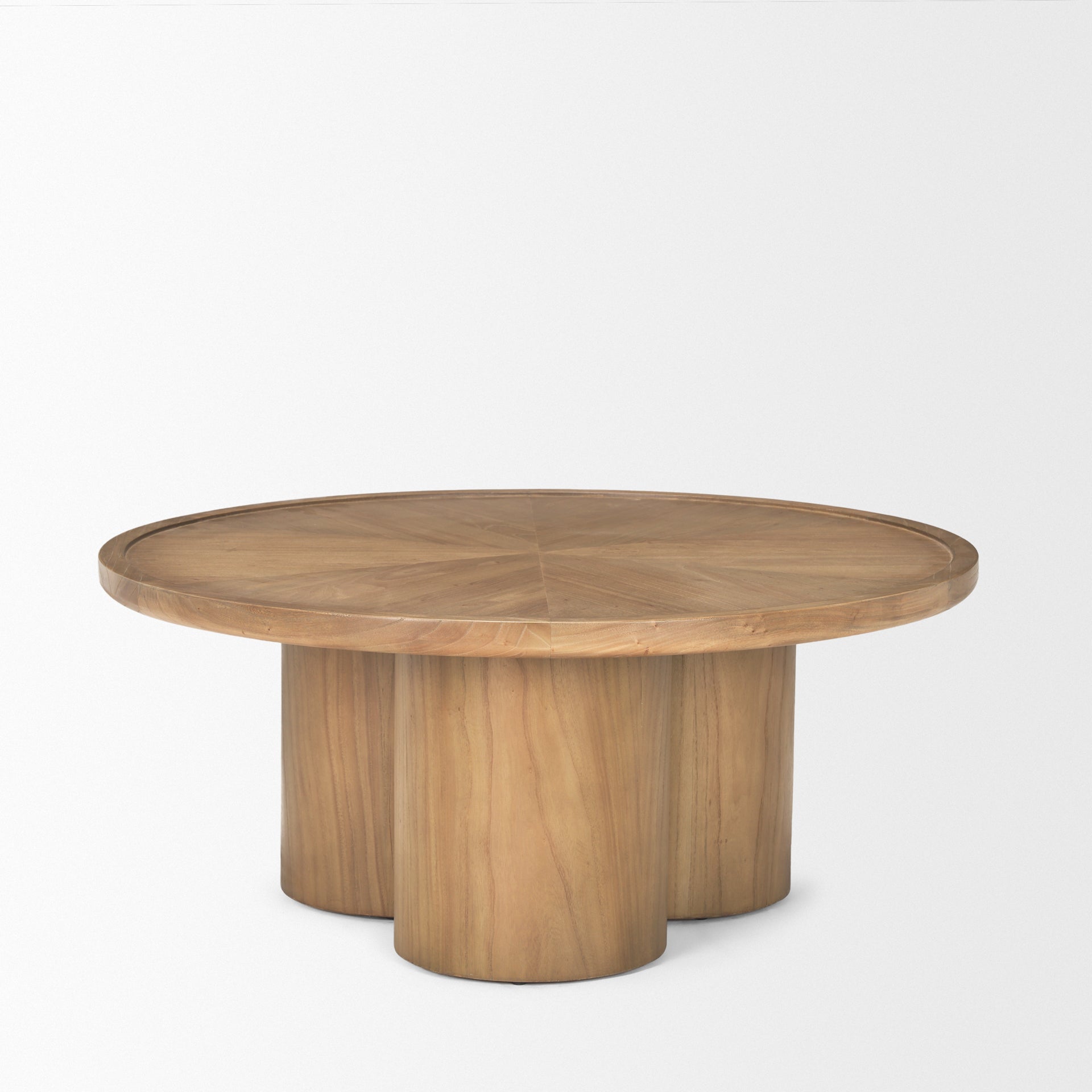 Front view of the Tavi round coffee table in a medium brown oak finish featuring a chunky double-cylinder pedestal base