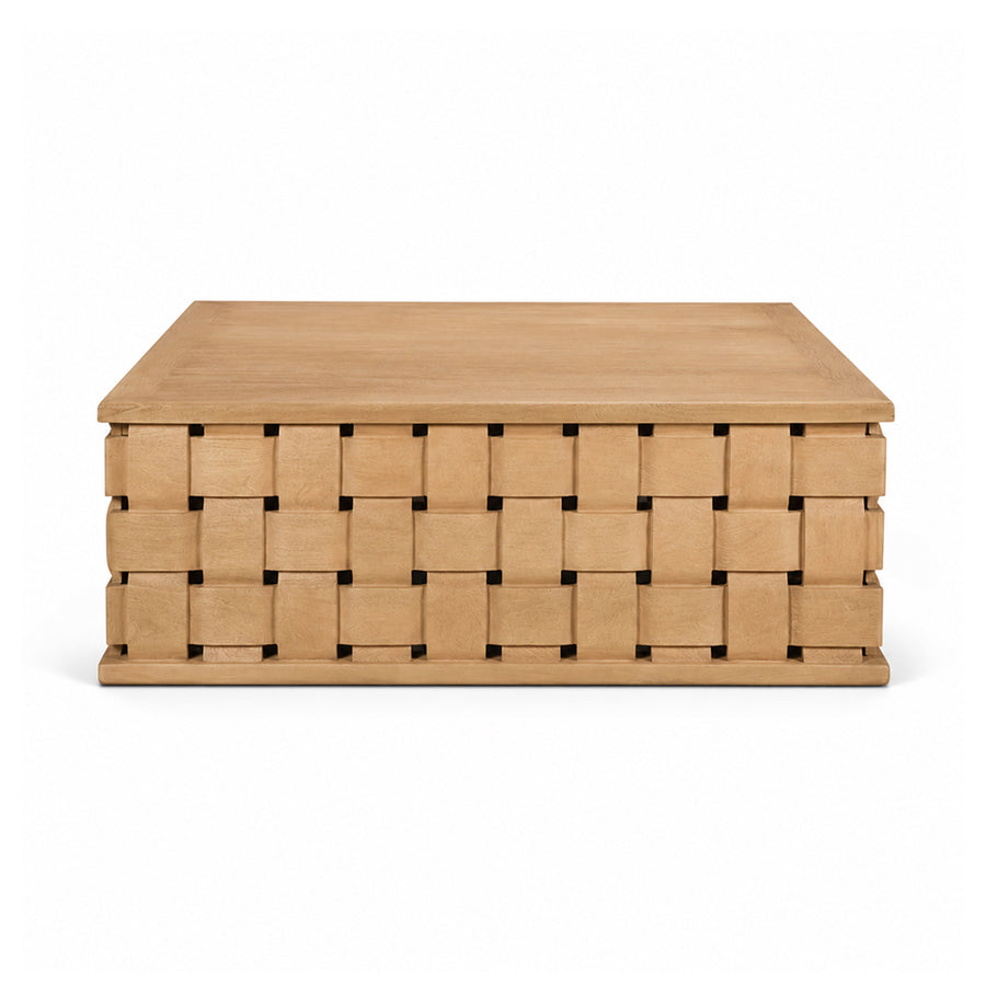 Front view of the Trellyn square coffee table featuring a light natural wood finish and a unique hand-carved woven pattern base