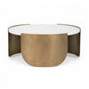 Front view of the Verker coffee table featuring a thick circular white marble top with subtle grey veining and an antique brass curved metal base
