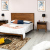 High-angle view with the drawer pulled out highlighting the deep storage capacity and sleek brass-toned tab handle