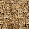 Macro detail shot showcasing the thick organic weave and natural color variations of the medium brown seagrass