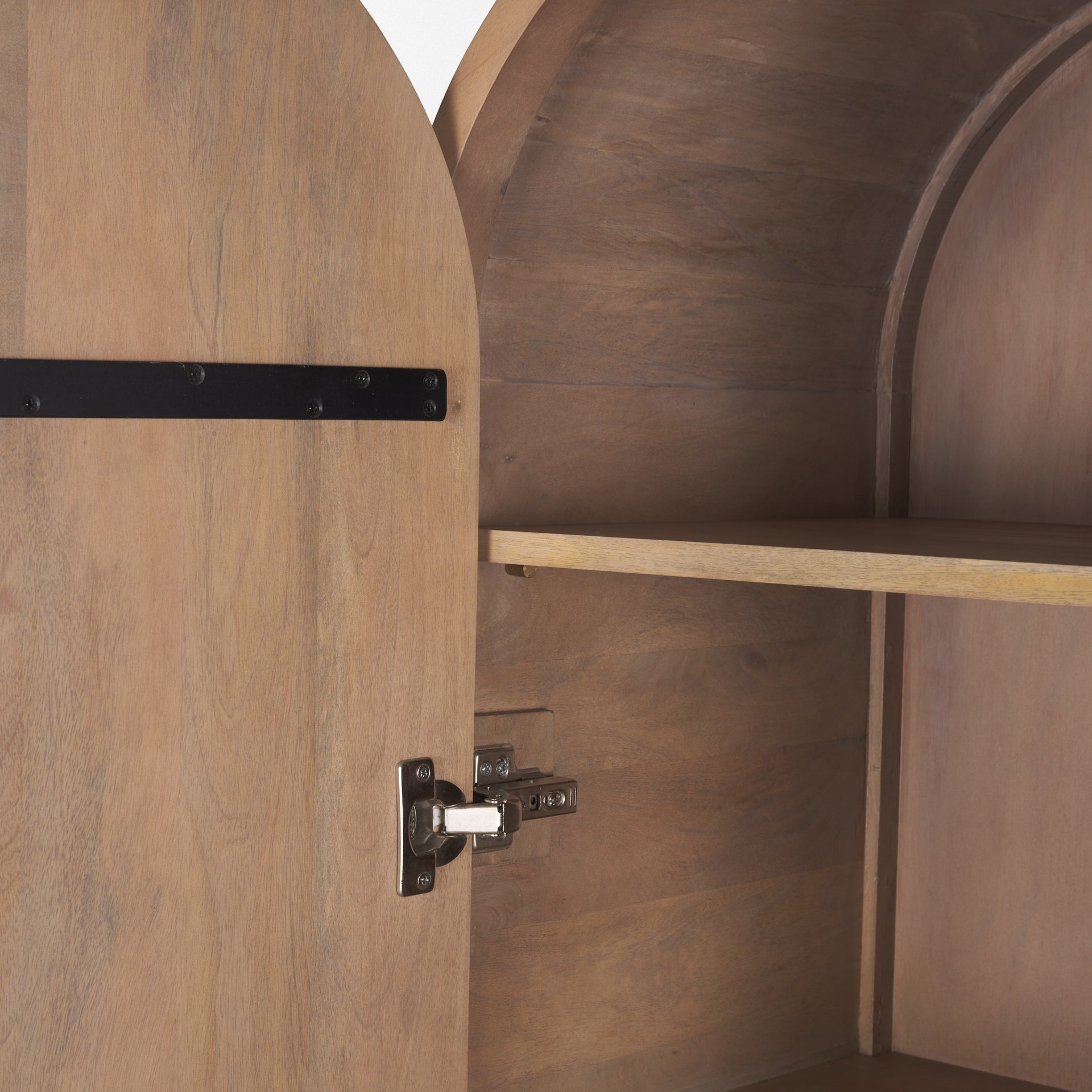 Front view of the Sorina curio cabinet featuring a light brown wood finish and a striking reverse fluted arched design