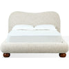 Front view of the Afra upholstered bed featuring a soft cream chenille fabric and a modern wave-shaped rounded headboard