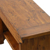 Macro shot highlighting the rich multi-tone African Dusk finish and natural wood knots of the bench surface