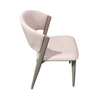 Side profile view highlighting the elegant curve of the backrest and the clean silhouette of the beige dining chair