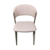 Front view of the Akki dining chair featuring beige upholstery and a curved wrap-around backrest with tapered legs