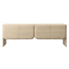 Front view of the Alaia 4-door sideboard in a light natural ash finish featuring a minimalist floating silhouette and rounded bottom door corners