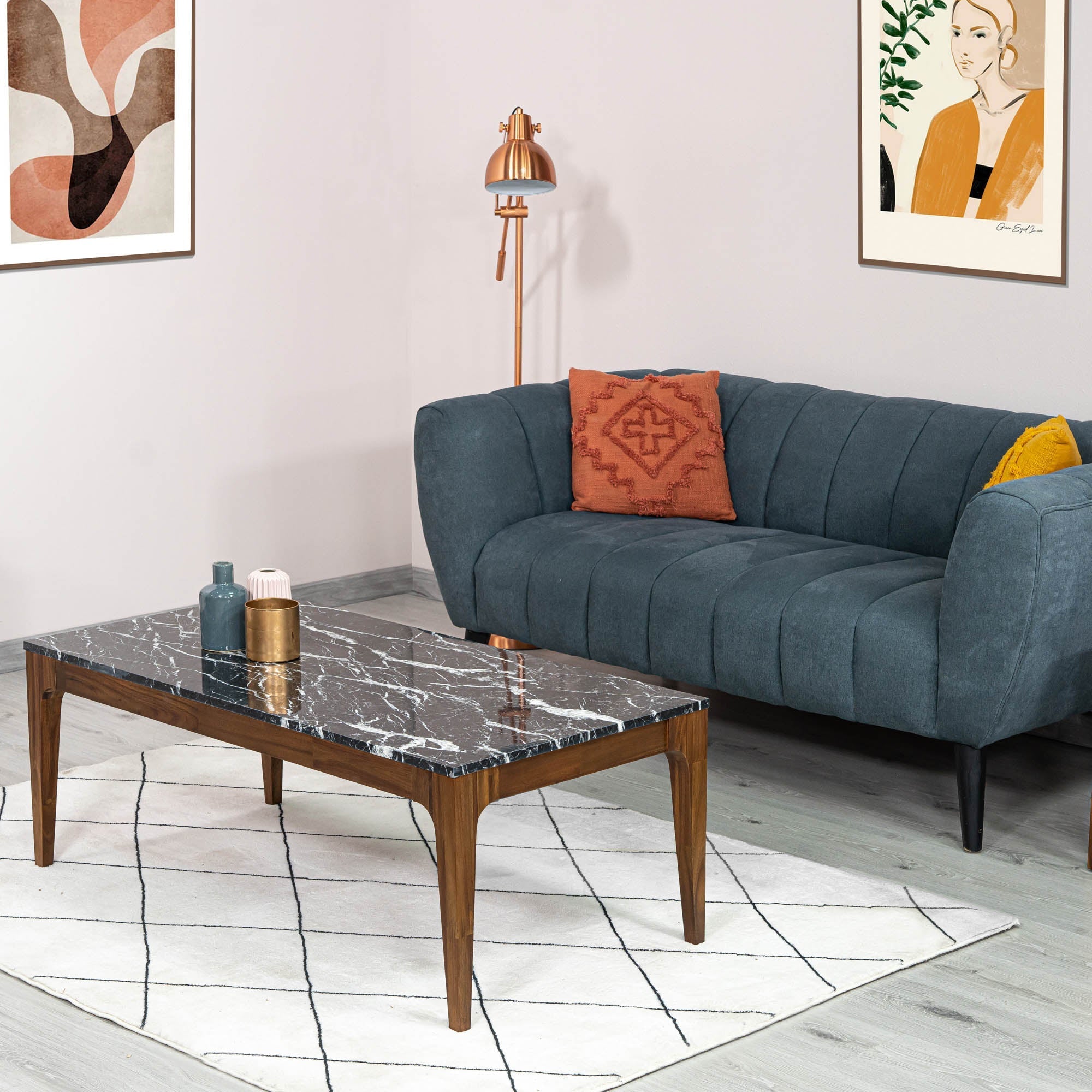Front view of the Allure coffee table featuring a rectangular black marble top with white veining inset in a rich walnut wood frame