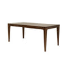 Three-quarter perspective view showcasing the slim tabletop profile and stable architectural leg design