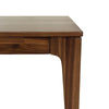 Close-up perspective shot focusing on the seamless connection between the table apron and the flared wood legs
