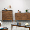 Wide room lifestyle shot featuring the 4-drawer chest alongside the matching dresser and nightstand for a complete suite